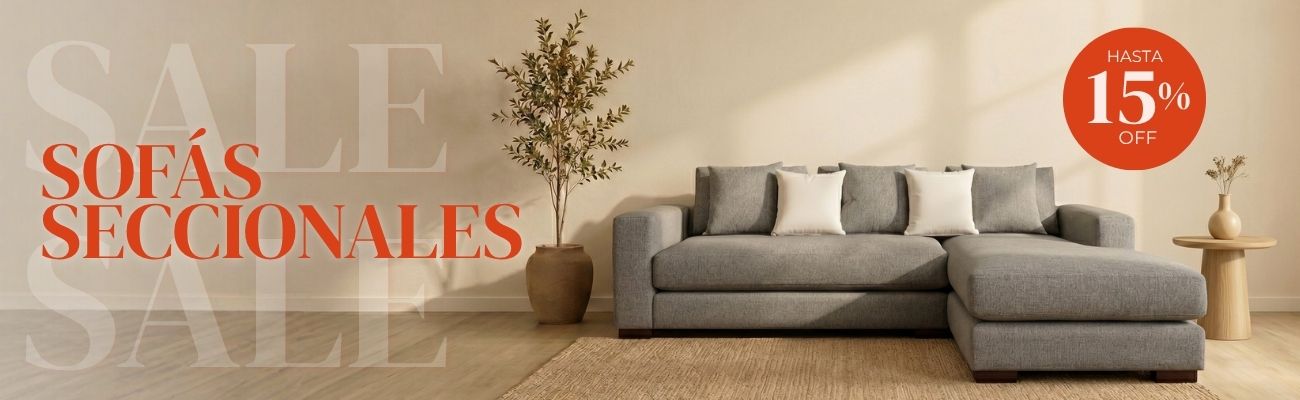 Sofá seccional gris en salón moderno